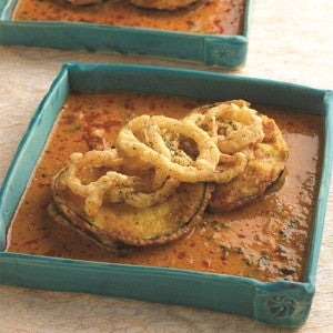 Eggplant in Thick Yogurt and Garlic Curry with Battered Fried Onions