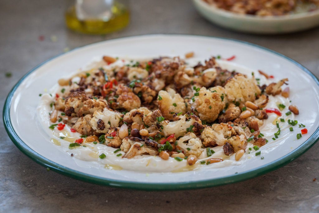 Lemony Roasted Cauliflower and Pine Nuts Over Labneh
